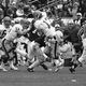Dan Marino is hit by Penn State LB Ken Kelley in the 1982 matchup. Rusty Kennedy/AP Images